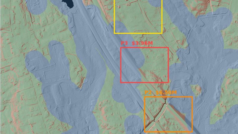Three candidate warehouse pads on the Hopkinton parcel, each labelled with its earthwork cost